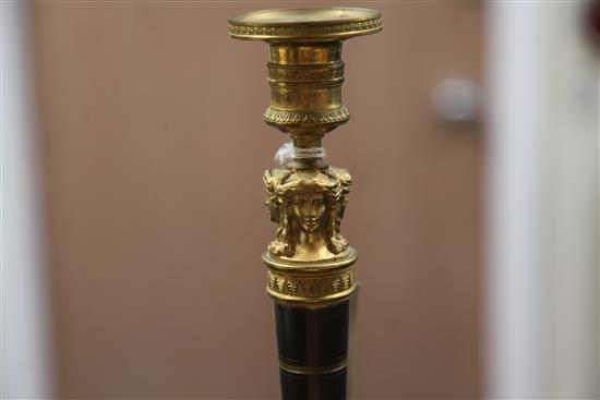 A pair of Empire style bronzed ormolu candlesticks, 10.5in.